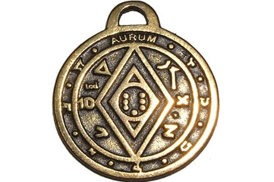 A coin amulet for success and wealth