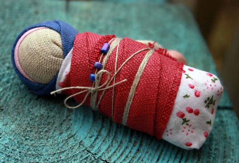 A diaper doll as a health amulet
